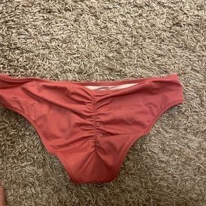 Rose colored bathing suit bottoms